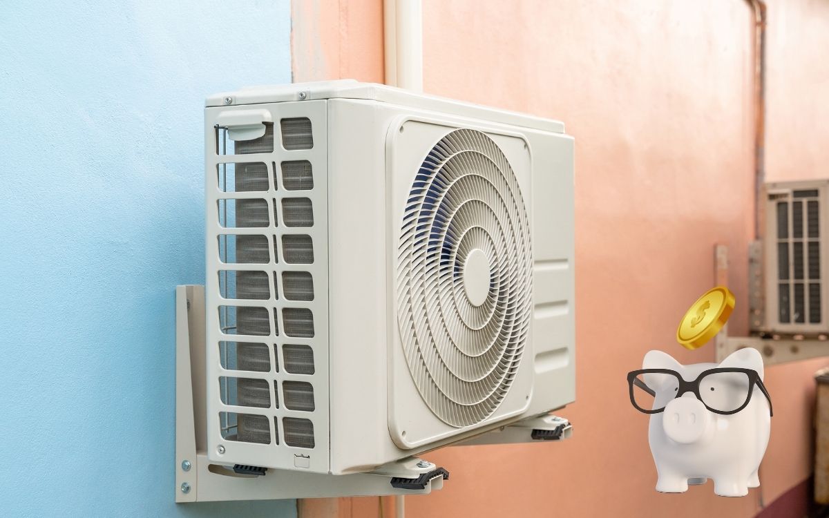 Air conditioning unit on a wall with a piggy bank wearing glasses and a gold coin.